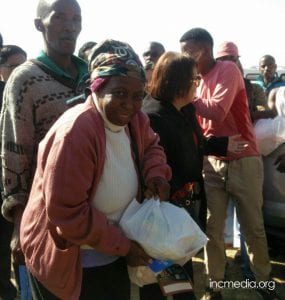 Woman holding relief goods
