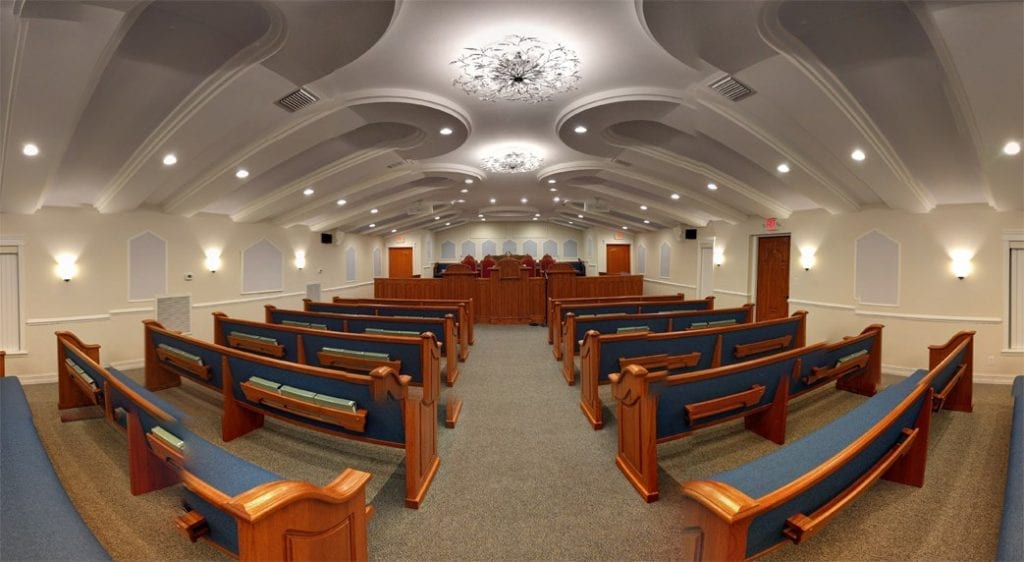 A wide angled shot from the back of the interior of the South Jacksonville house of worship.