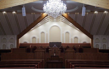 Interior shot of the Regina house of worship from the back.