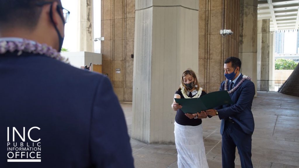Hawaii State Senator, Bennette E. Misalucha and Representative Sonny Ganaden
reads the certificate to INC Ministers present
