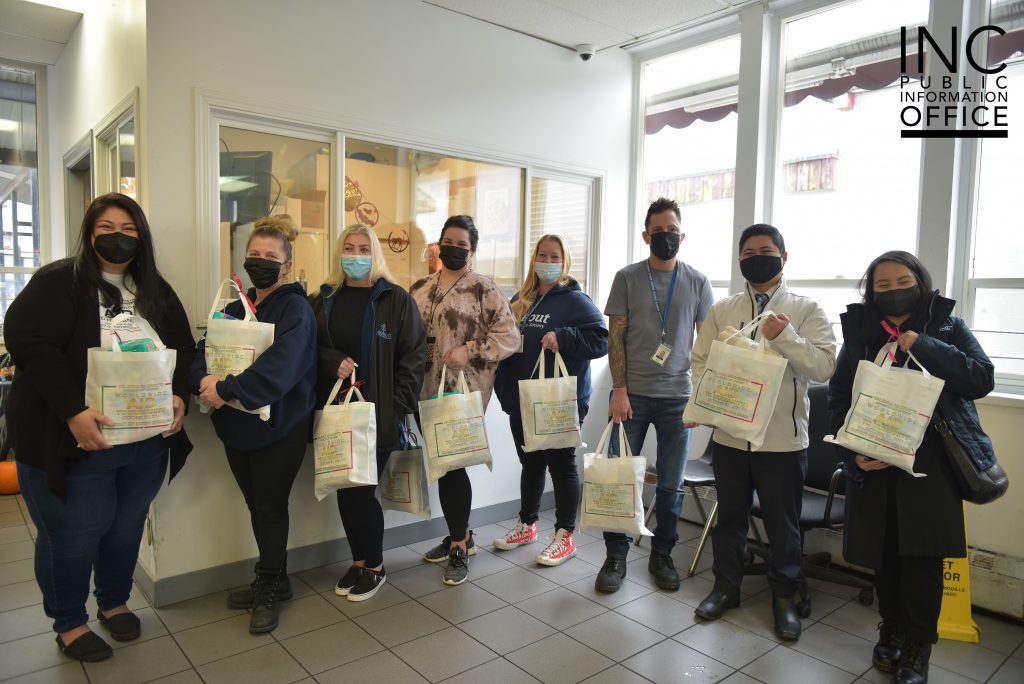 Shelter coordinators gladly receive and hold care packages donated by the Church Of Christ through the Aid To Humanity event held in October of 2021.