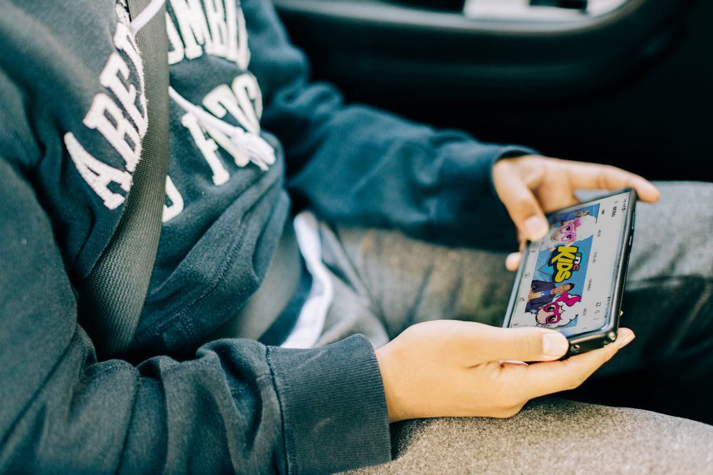 Young person watching inckids on phon