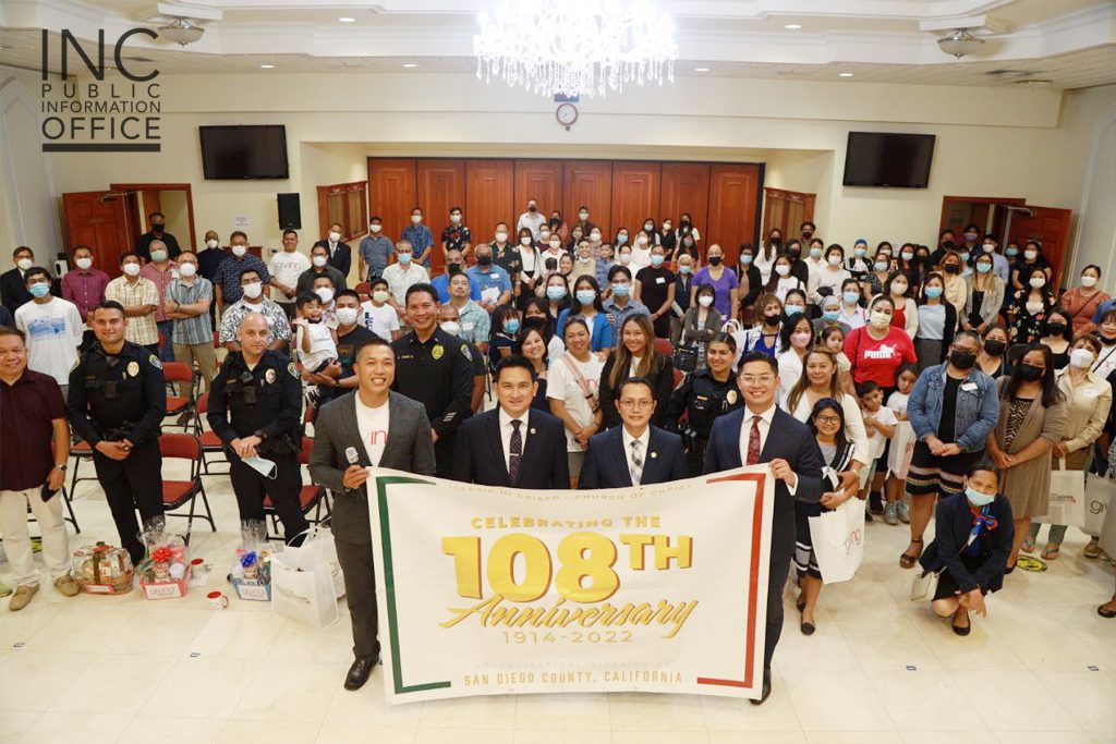 Congregation members, community members and public servicemen gather for a group photo inside the house of worship at South San Diego, California, during one of eight community celebrations during the 108th Anniversary of the Iglesia Ni Cristo, Church Of Christ.