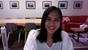 girl in white smiling