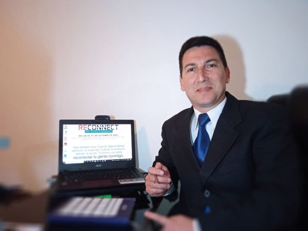 man sitting in front of a computer