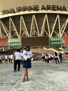 girl in front of philippine arena